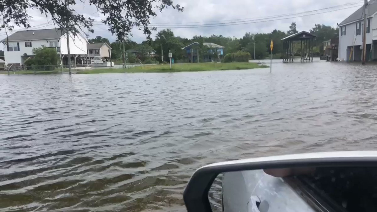 Coastal flooding in Bay St Louis, MS making low lying roads impassable along the bay with persistent onshore flow well ahead of HurricaneSally 