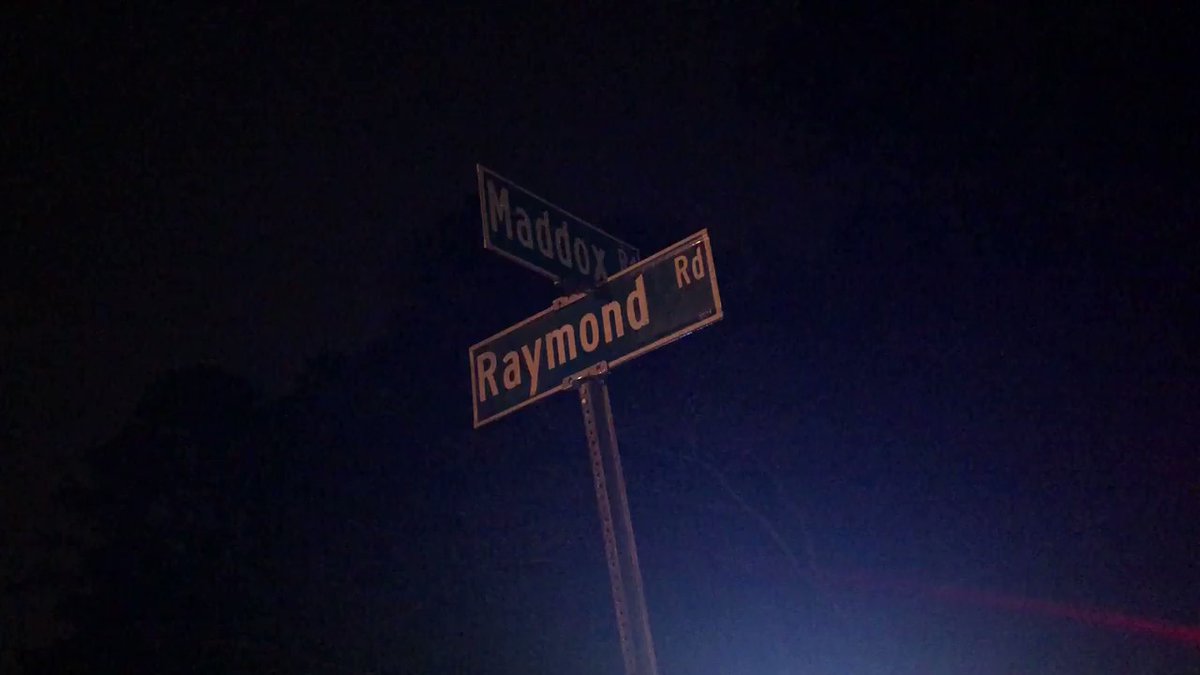Came around to the other side of that scene to the corner of Maddox and Raymond Roads. Traffic lights down. One looks crushed and others are dangling low to the ground